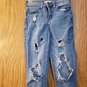 Very cute, distressed, high rise, curvy, jegging jean, size 1/25. Great shape.